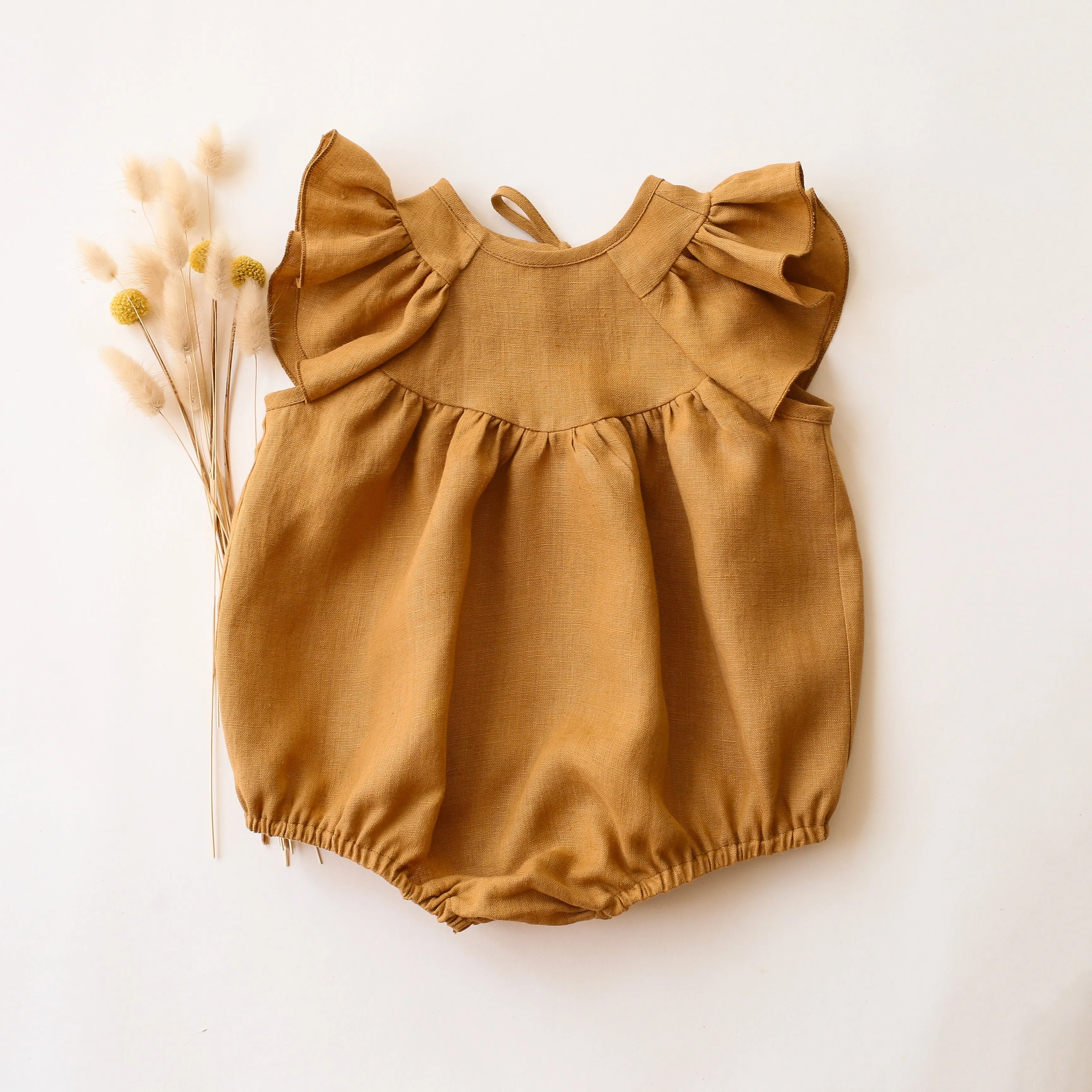 Mustard Linen Flutter Sleeve Tie Back Bubble Playsuit