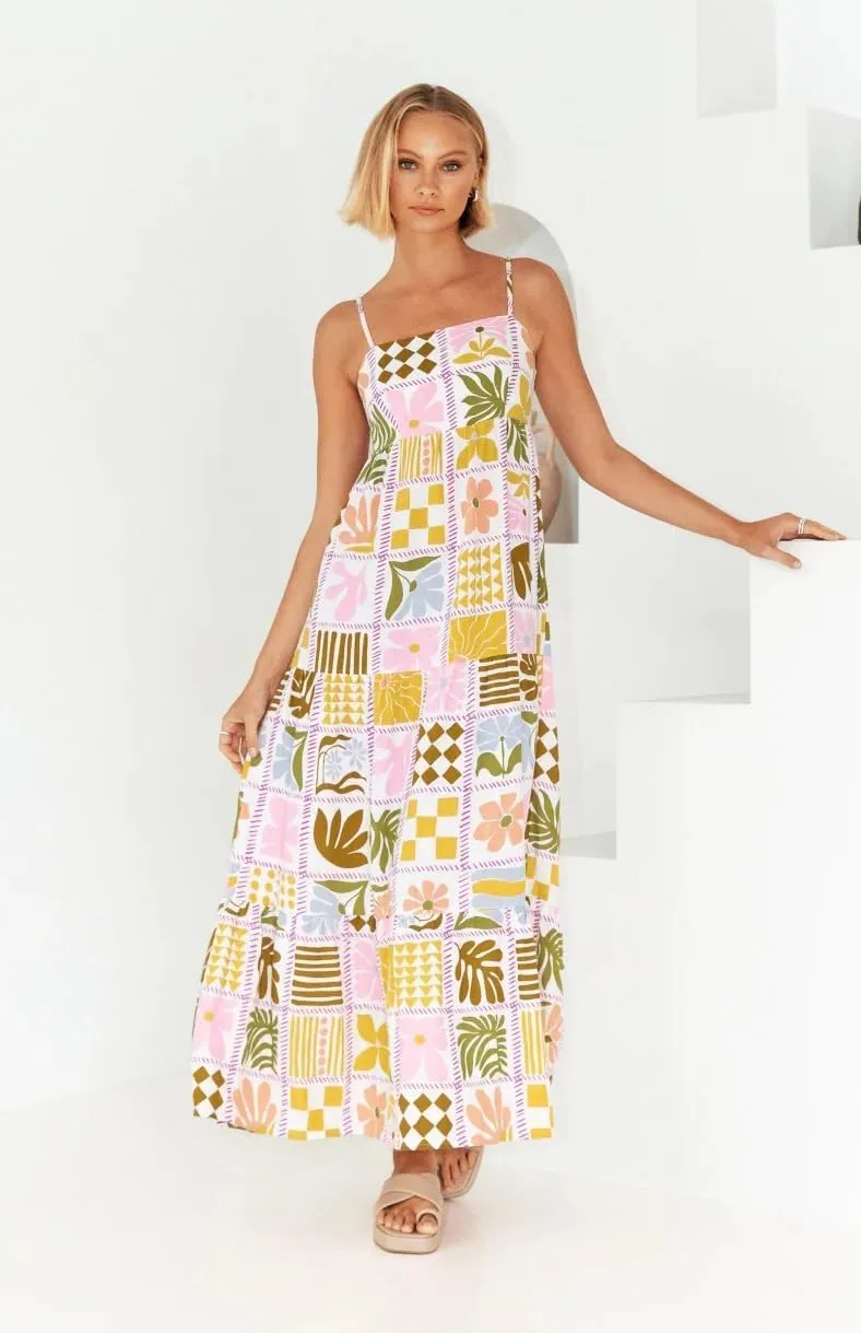 utcoco Women's 2024 Summer Spaghetti Strap Sundresses Back Smocked Cut Out Floral Printed Cute Flowy A Line Maxi Dress