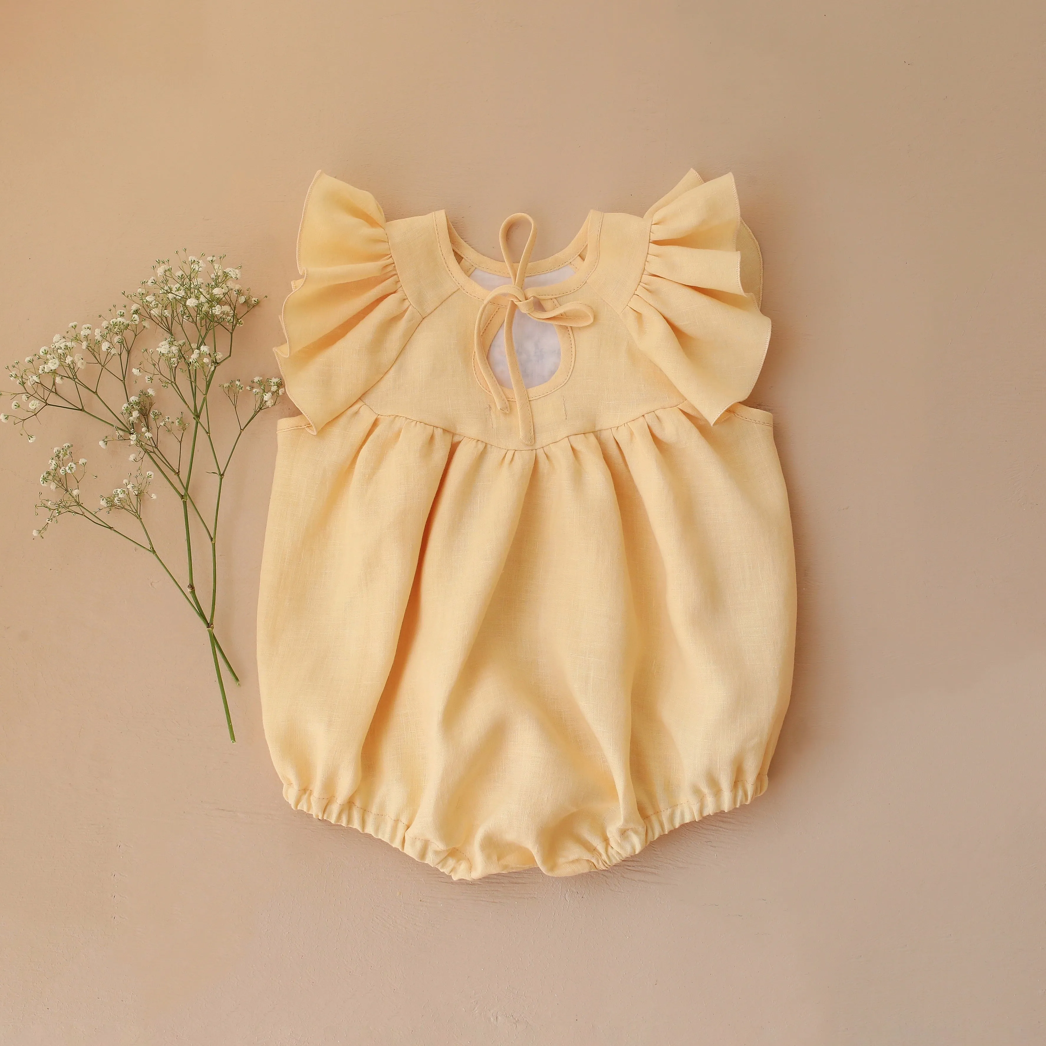 Vanilla Linen Flutter Sleeve Tie Back Bubble Playsuit with "Bunny in Daisy Wreath" Embroidery